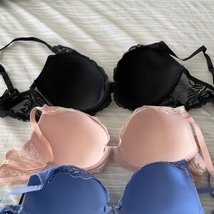 Natori 3 pack / set of bras. Black, pink, blue. Size 36D.